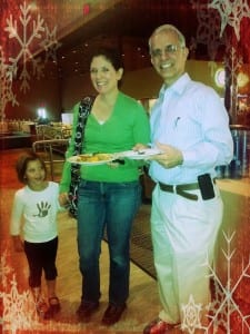Our owner, Dave with Emily and her little girl at our Christmas party.