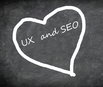 chalk board with a heart and text saying UX and SEO
