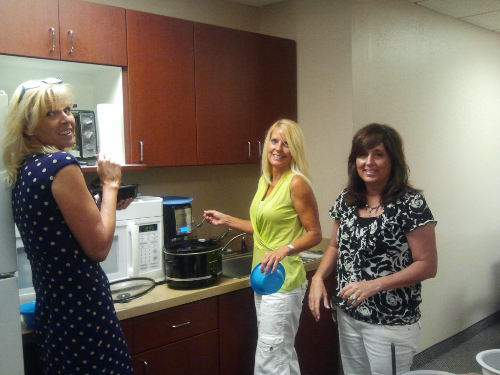 Jill, Chris, and Kaycie getting everything ready.