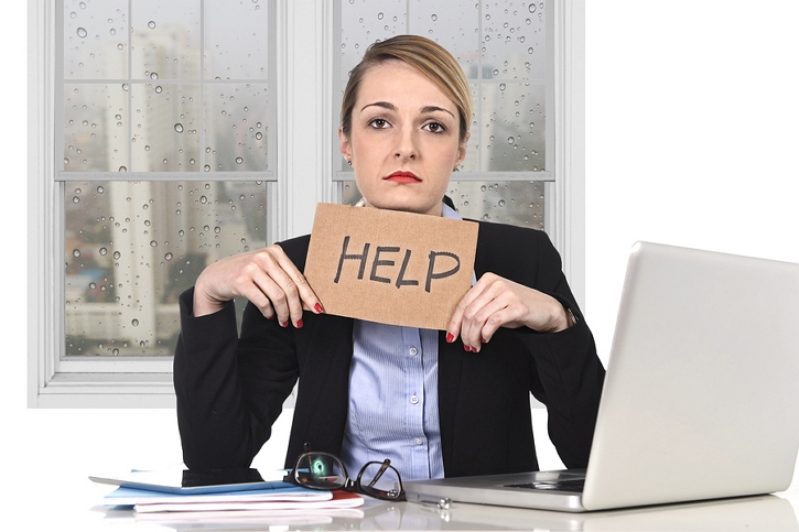 Dental Front Office Staff Holding Help Sign in Need of Marketing Consultant
